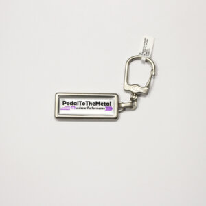 Pedal to the metal, keychain
